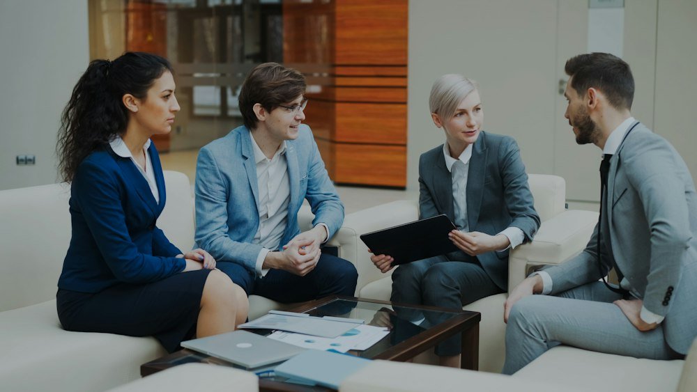 Professionals discussing a financial plan together